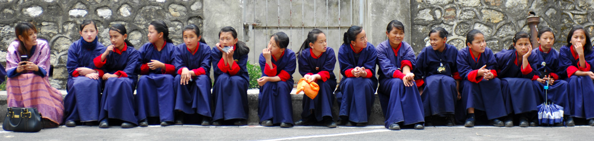 Schoolgirls waiting for the bus, Thimphu, Bhutan