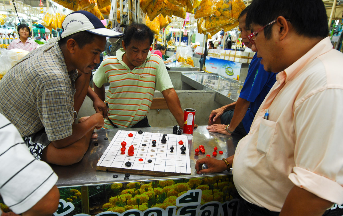 Chess players, flower and vegetable market